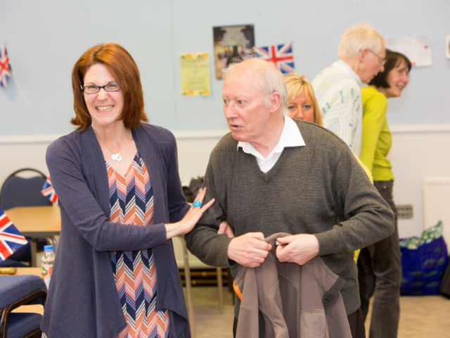 lady walking with older gentleman