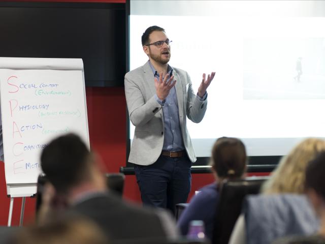 Man giving a presentation at an event
