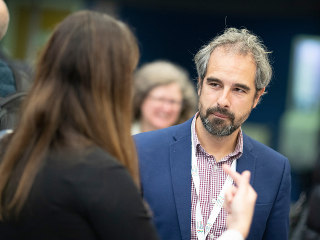 Male attendees at a conference