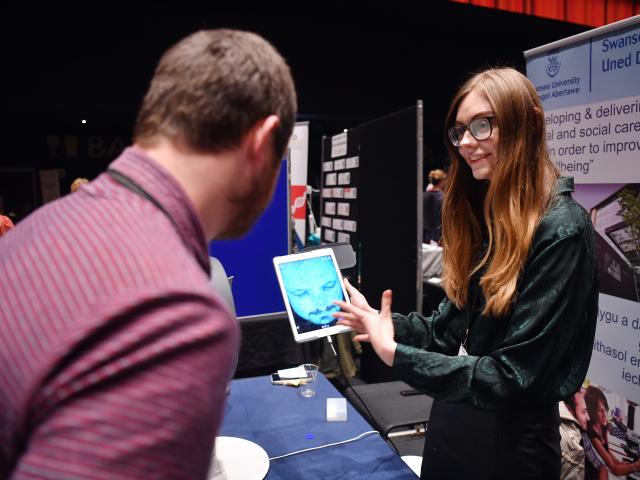 Member of the public engaging with an exhibit