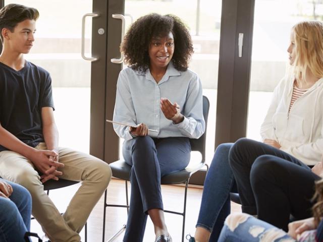 Diverse group of people in discussion