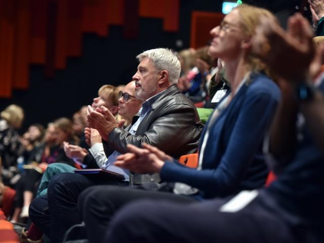 Audience applauding