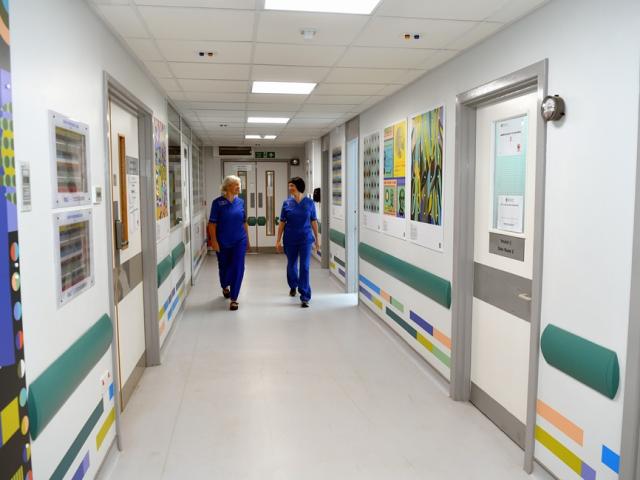 Nurses walking down a corridor