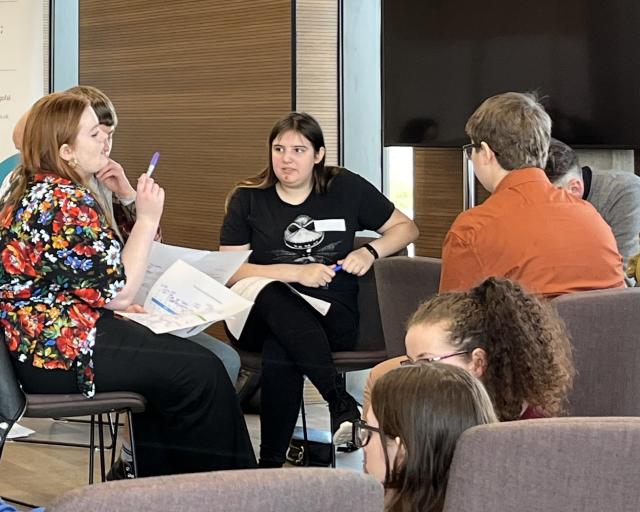 Group of young people in discussion