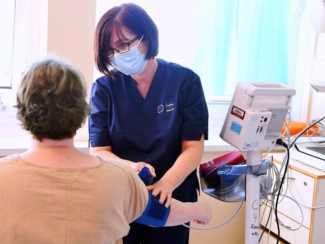 Participant having blood pressure taken