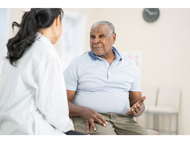 man_talking_to_medical_professional