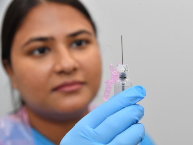 Nurse with a vaccine close up