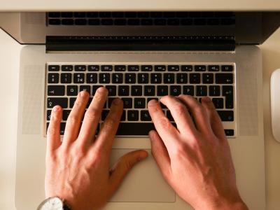 hands_typing_on_a_laptop